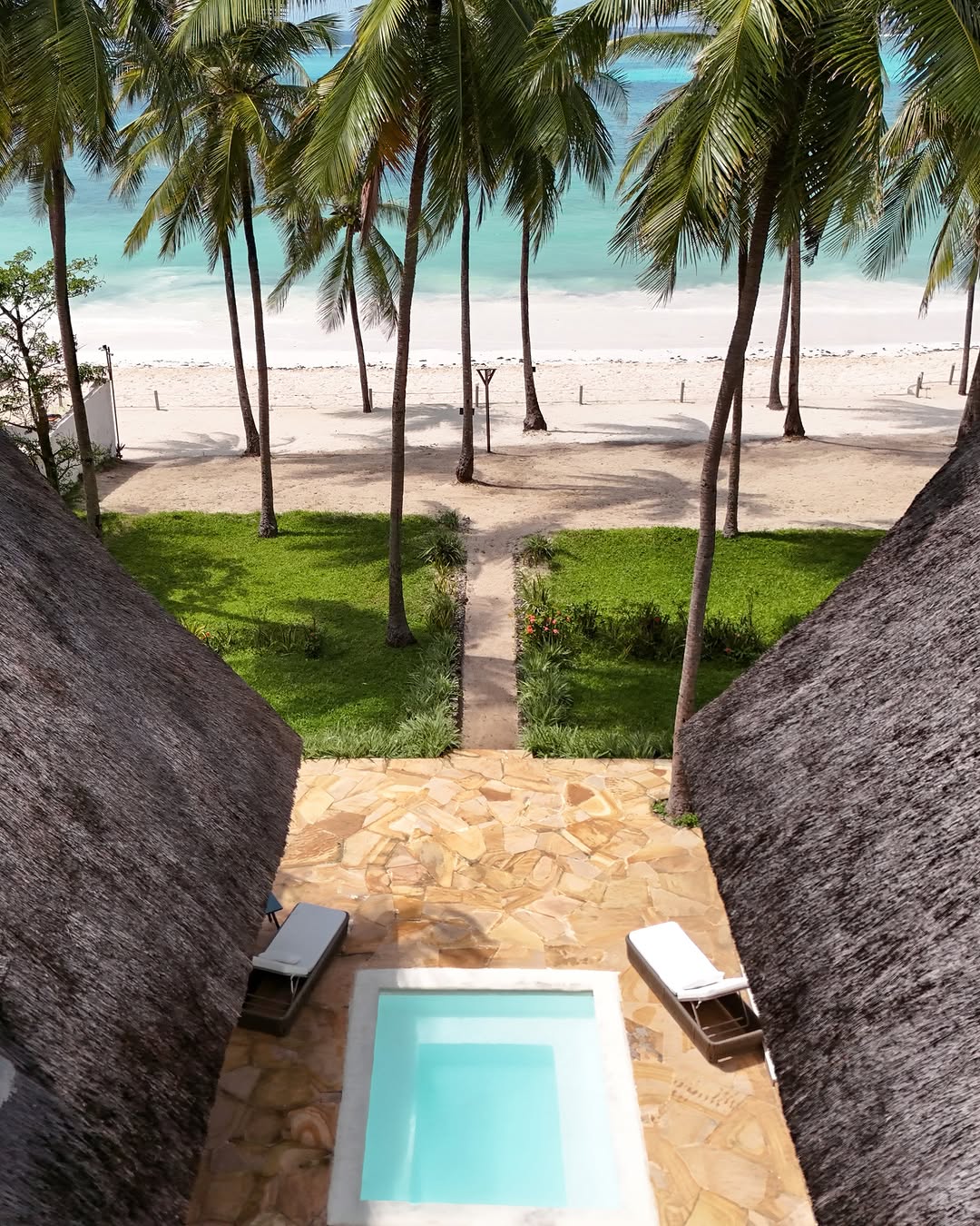 Villa from above, where green meets endless blue
🌴 🚁 🌊 ☀️ 🤍
Villas tucked in tropical gardens, the reef just beyond the shore. This is home for your next escape.

See it all. Link In Bio.

#karafuubeachresort #zanzibar #aerialview #droneview #travelafrica #islandvibes